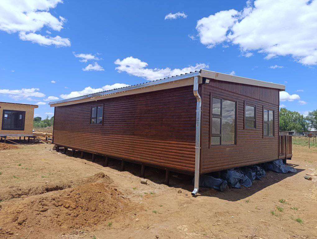 8M BY 12M Three Bedroom Cabin Back View